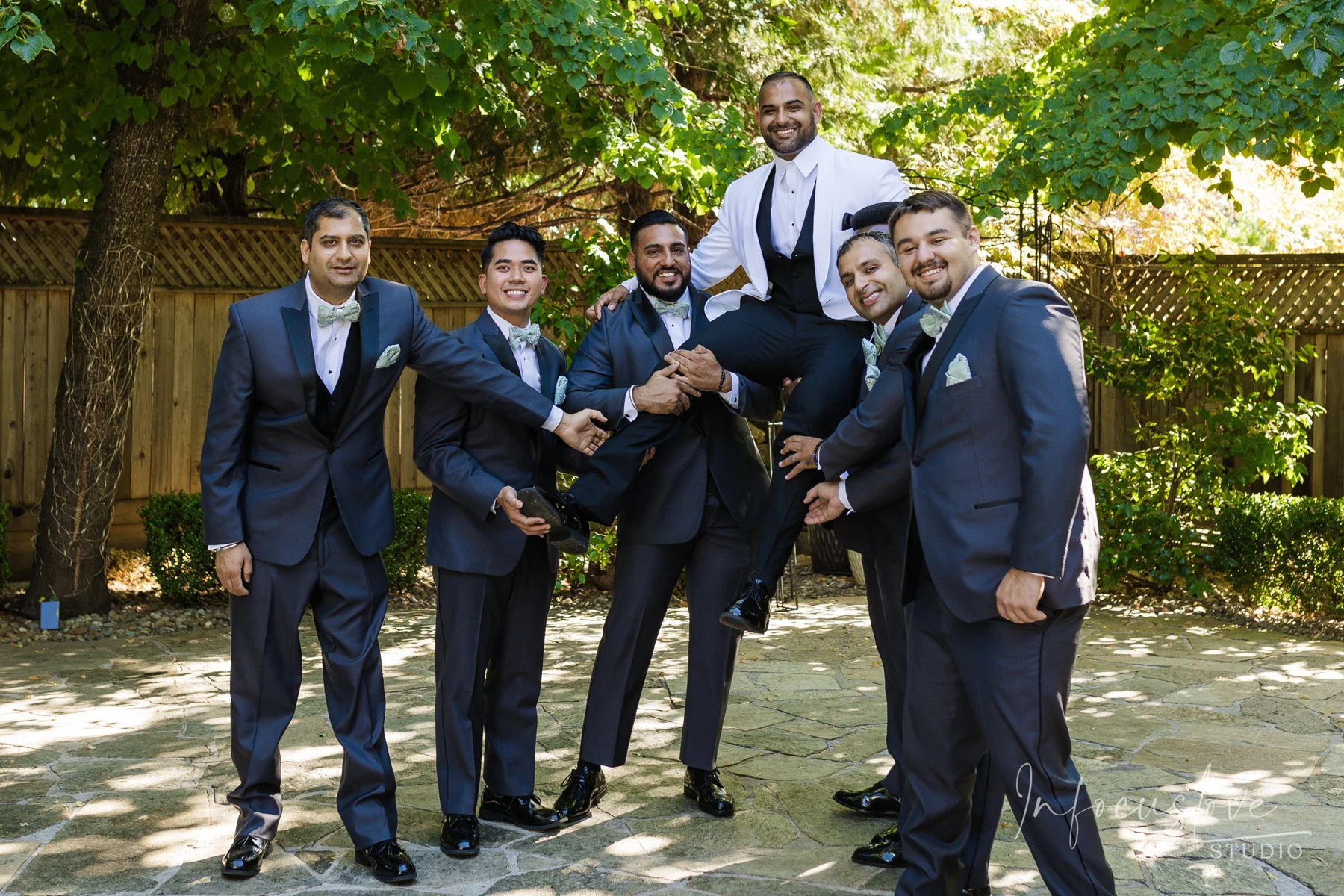 Wedding party sharing a laugh
