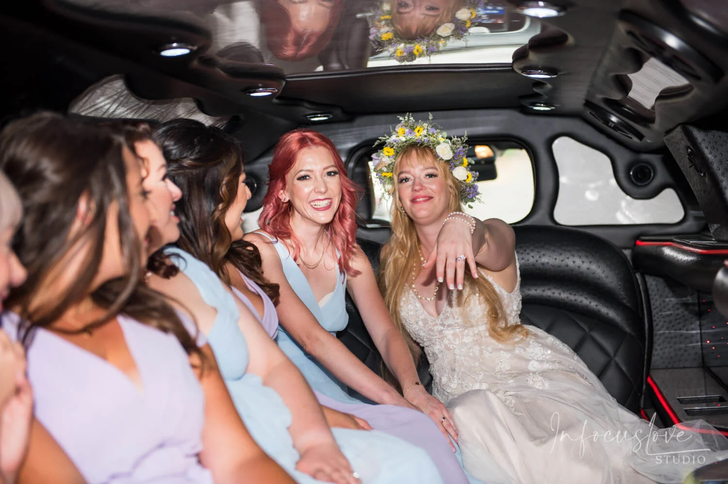 Friends laughing together in a car
